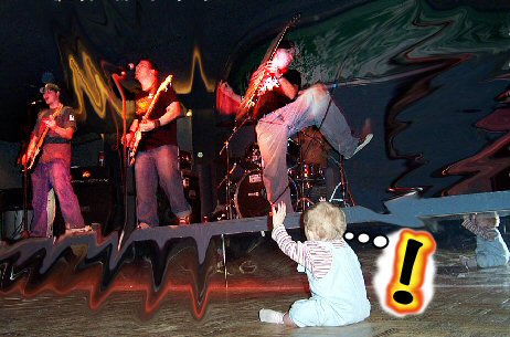 {waving in front of stage)